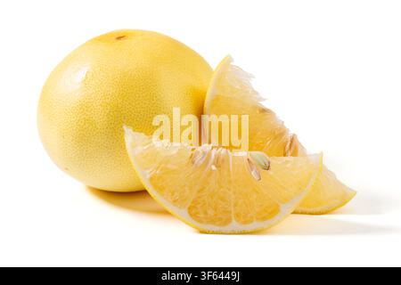 Whole and Sliced Yellow Grapefruit Pomelo Stock Photo
