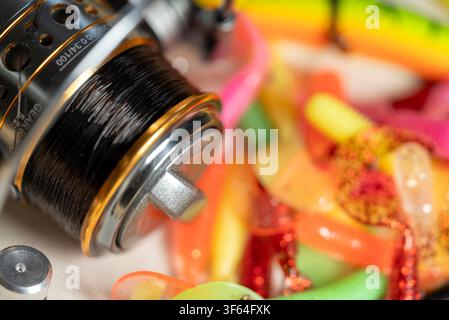 Detailed shot of a metal fishing reel ready for a weekend trip Stock Photo