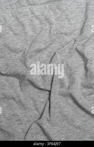 Crumpled light gray heather cotton fabric texture. Stock Photo