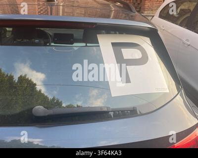 Cremona, Italy July 8th 2026 Provisional P plate displayed on a car's rear window, indicating a new driver learning road rules in Cremona, Lombardy, I Stock Photo