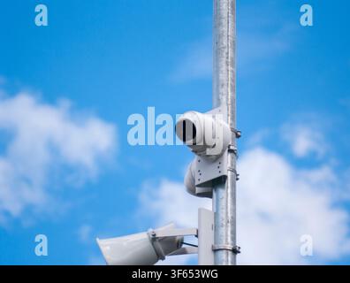Bavaria, Germany - March 8, 2008: Multiple surveillance cameras mounted on a security pole for video monitoring, public safety, and property surveilla Stock Photo