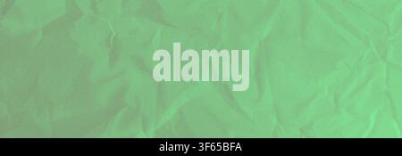 Wrinkled paper texture with abstract halftone dot pattern on green crumpled background. Vector grunge halftone gradient in emerald color newspaper. No Stock Vector