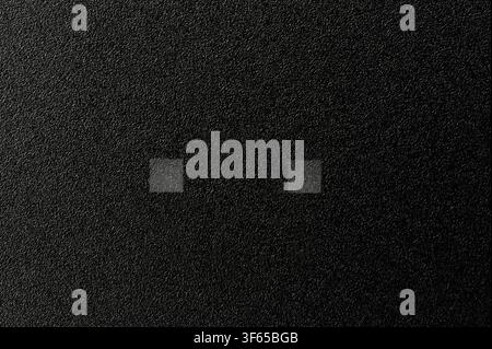 Black plastic matte surface with light indicator squares macro close up view Stock Photo