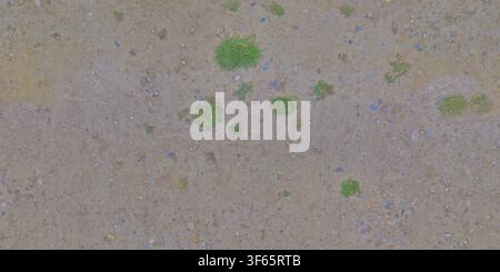 Top down view of dry sandy soil surface featuring small patches of growing green grass and tiny stones. Stock Photo