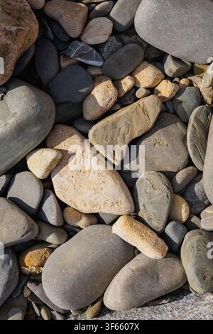 Rounded Beach Stones Background With Natural Coastal Texture Stock Photo