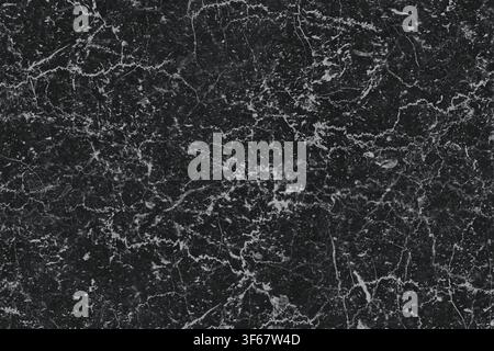 High resolution texture of black marble featuring fine white linear veins. Stock Photo