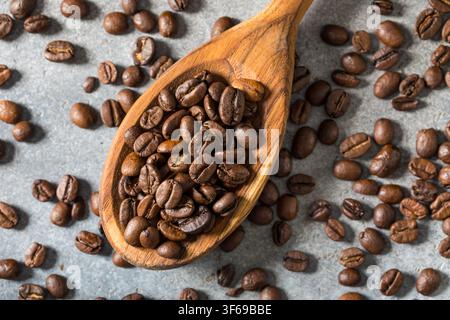 Raw Brown Organic Dry Coffee Beans in a Heap Stock Photo