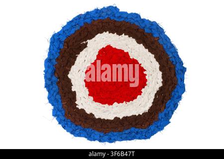 Handmade home rug on a white background. Woolen round homemade rug. Stock Photo