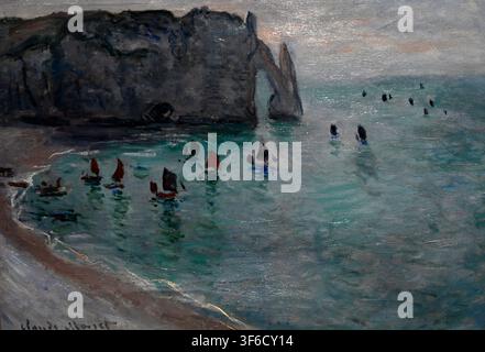 Étretat, Sortie de bateaux de pêche (Fishing Boats Leaving Étretat, 1886) by Claude Monet. Oil on canvas depicting fishing boats with colorful sails l Stock Photo