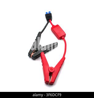 Portable car jump starter cable with battery clamps on a white background Stock Photo