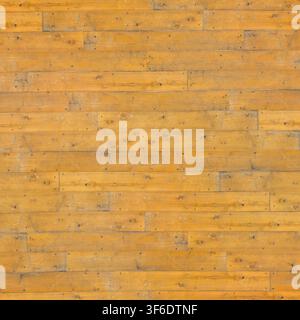 Horizontal background pattern of golden yellow pine wood planks. Stock Photo