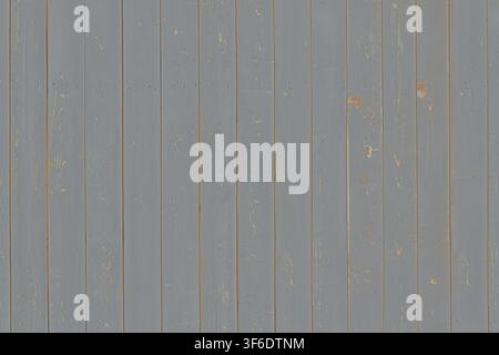 Vertical slate grey painted wood planks showing subtle wear along edges. Stock Photo