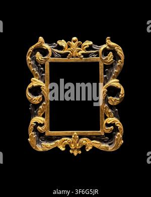Old decorative golden picture frame isolated on black background Stock Photo