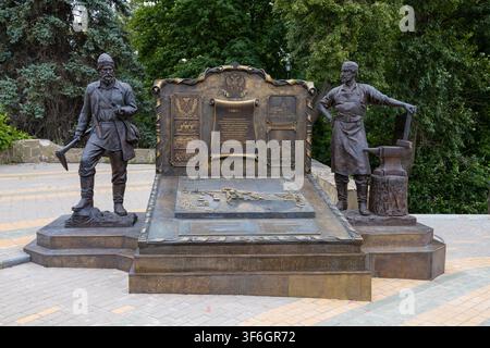 LIPETSK, RUSSIA - JULY 17, 2026: A sculptural composition commemorating the construction of metallurgical plants in 1703. A fragment of the monument t Stock Photo