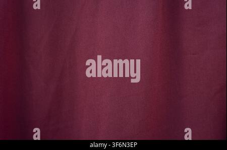 Plain Burgundy Fabric Texture Background With Copy Space Stock Photo