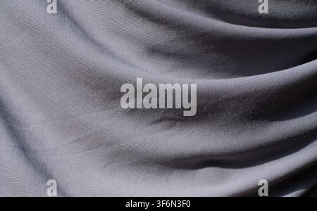 Light Gray Wrinkled Fabric Texture Background Close Up Stock Photo