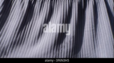 Gray Pleated Fabric Texture Background With Vertical Folds Stock Photo