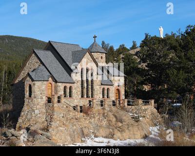 Saint Catherine's Chapel on the Rock with the Sacred Heart of Jesus statue along Colorado's Peak to Peak Highway in winter. Stock Photo