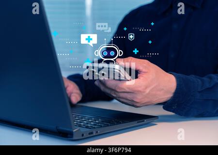 Close-up of a professional using smartphone beside laptop with healthcare chatbot interface, ideal for telemedicine, AI assistance, digital health sup Stock Photo