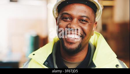 Civil engineer, portrait and man with helmet in building, property development or renovation project. Happy, architect and black person with hard hat Stock Photo