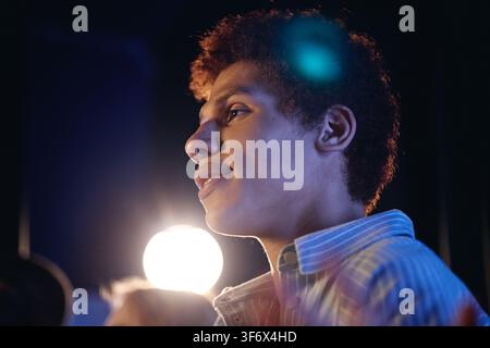 Teenager Performing on Stage during Student Theater Production Stock Photo