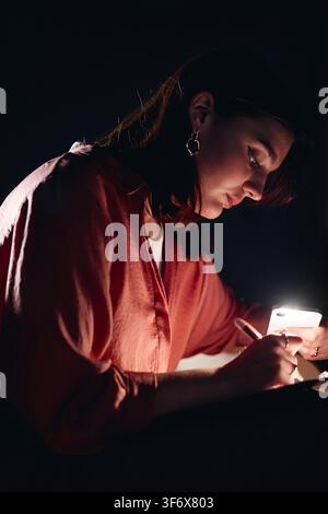 Girl Writing Script Backstage during Student Theater Production Stock Photo