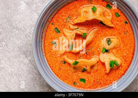 Coconut creamy dumpling soup or curry dumpling soup, top view. Stock Photo