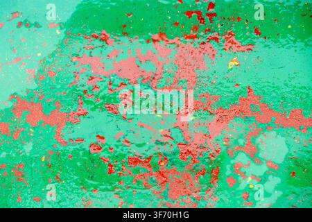 Collection of abstract textures with white and red paint splatters and marks on a weathered green industrial surface, no people Stock Photo