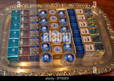Original Salzburg Mozartkugel Chocolates on Silver Tray in Showcase of Cafe Furst Austria Europe. Traditional Salzburger Mozartkugeln in Foil Wrappers Stock Photo