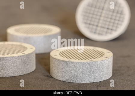 Gray Multi Jet Fusion 3D Printed Prototype Parts on Dark Surface Stock Photo