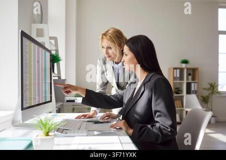 Positive Business People Working In Office Meeting Stock Photo