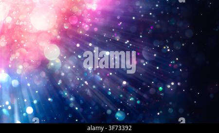 Sparkling glitter dust creating a mystical vibrant pink, purple, and blue bokeh of lights. Dreamy or magical shimmering particles softly glowing. Ethe Stock Photo