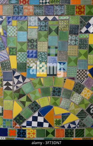 Colorful ceramic tile mosaic with decorative patterns and geometric designs Stock Photo