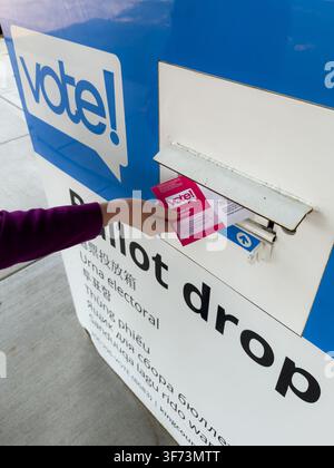 A mail in Ballot drop box is on site at a polling station as voters ...