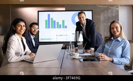 Portrait of multiethnic businesspeople engaging in training in conference room Stock Photo