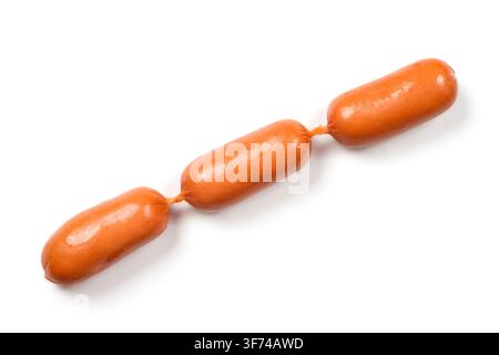 Three sausages on a white background. Fresh meat sausages. Stock Photo