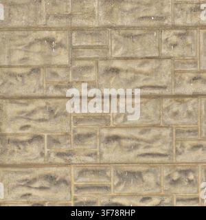 A light gray precast concrete wall surface molded with rectangular faux stone blocks. Stock Photo