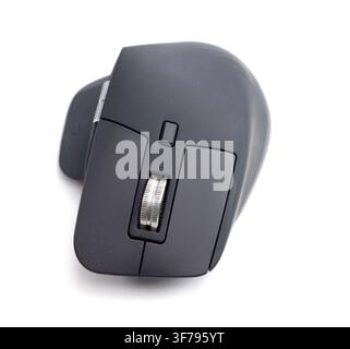 A modern black computer mouse rests isolated on a white background Stock Photo