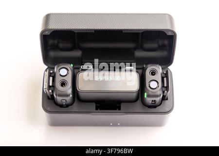 Wireless microphone charging case with transmitters and receiver inside Stock Photo