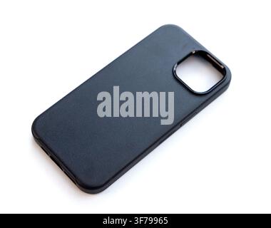 A black smartphone protective case lies on a white background Stock Photo