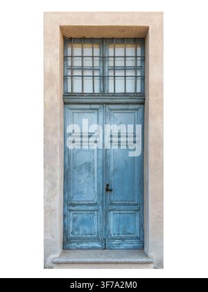 Ancient weathered blue wooden double door with rustic textured surface - set into a stone wall entryway and featuring window with iron security grille Stock Photo