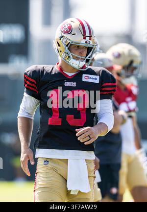 San Francisco 49ers quarterback Brock Purdy (13) drinks from a Gatorade ...