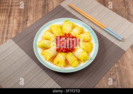 Asian Style Marinated Baby Chinese Cabbage Topped with Chili Peppers Stock Photo