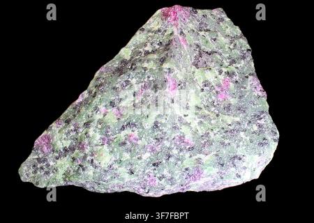 Specimen of the rock anyolite composed of red ruby, green zoisite and black pargasite Stock Photo