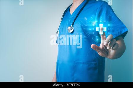 Healthcare professional in scrubs using AI-powered medical interface with digital healthcare icon. Medical technology, smart hospital, clinical innova Stock Photo