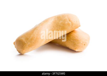 Crispy golden Italian breadsticks (grissini) stacked on a clean white background, perfect for snacks, appetizers, charcuterie boards, restaurant menus Stock Photo