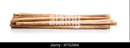 Crispy Italian breadsticks (grissini) arranged in a neat pile on a white background, highlighting golden-brown texture and crisp edges - perfect for f Stock Photo