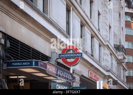 London Underground station signs and urban streetscape in central London, England, UK. Stock Photo