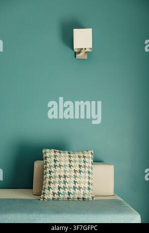 Modern sofa with decorative pillows in a stylish interior Stock Photo