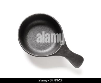 Empty black ceramic sauce dish with handle, top view, isolated on a clean white background for food presentation Stock Photo